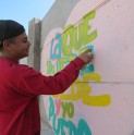 Joven andacollino entrega mensajes positivos a través de los grafitis